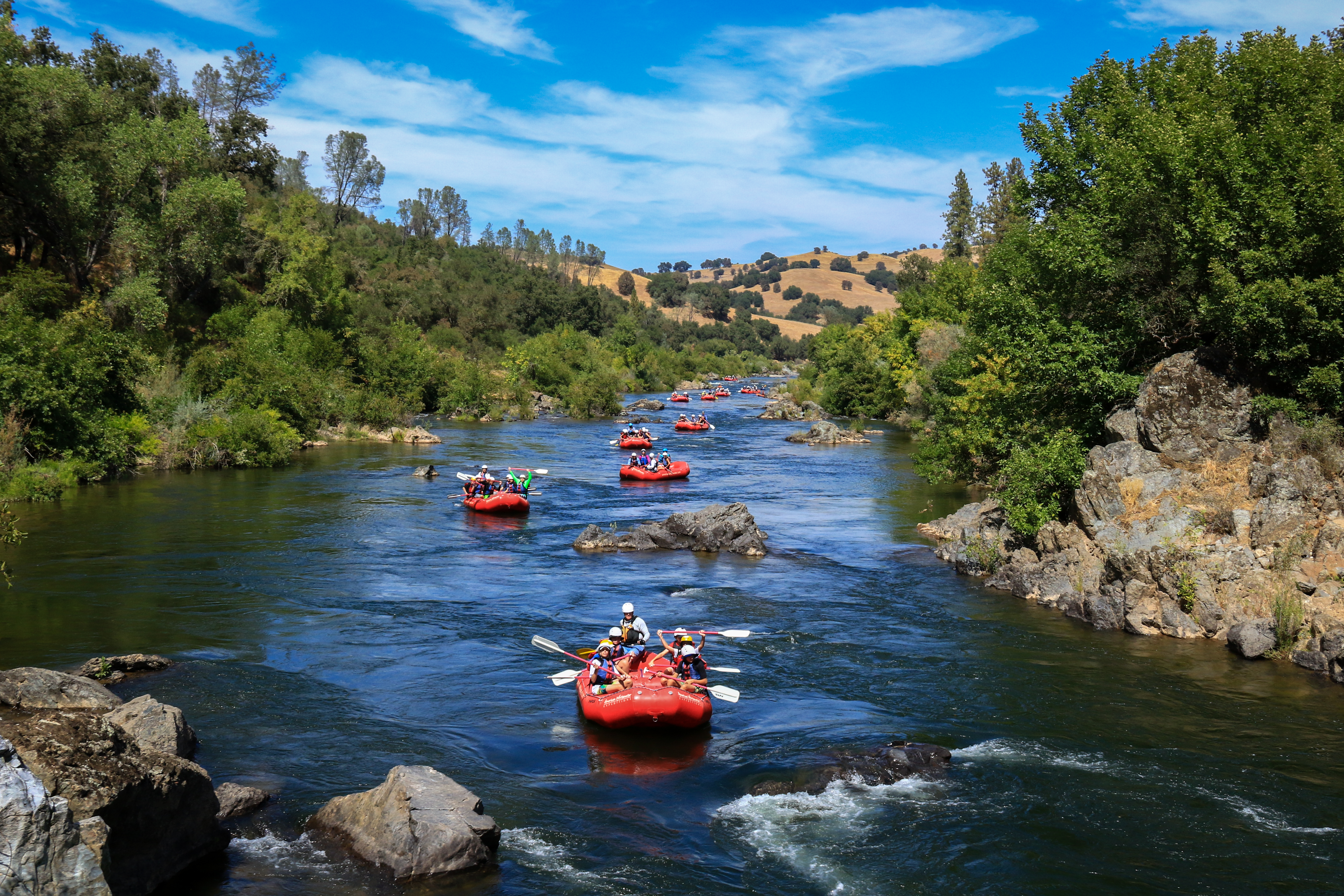 Rafts line up as they prepare to enter The South Fork Gorge. (American River, CA)